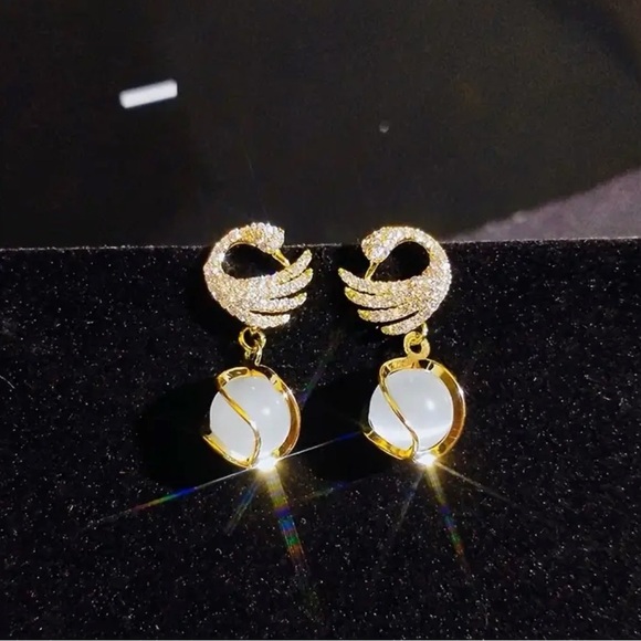 Elegant Gold and Silver Swan Earrings. - Picture 2 of 4